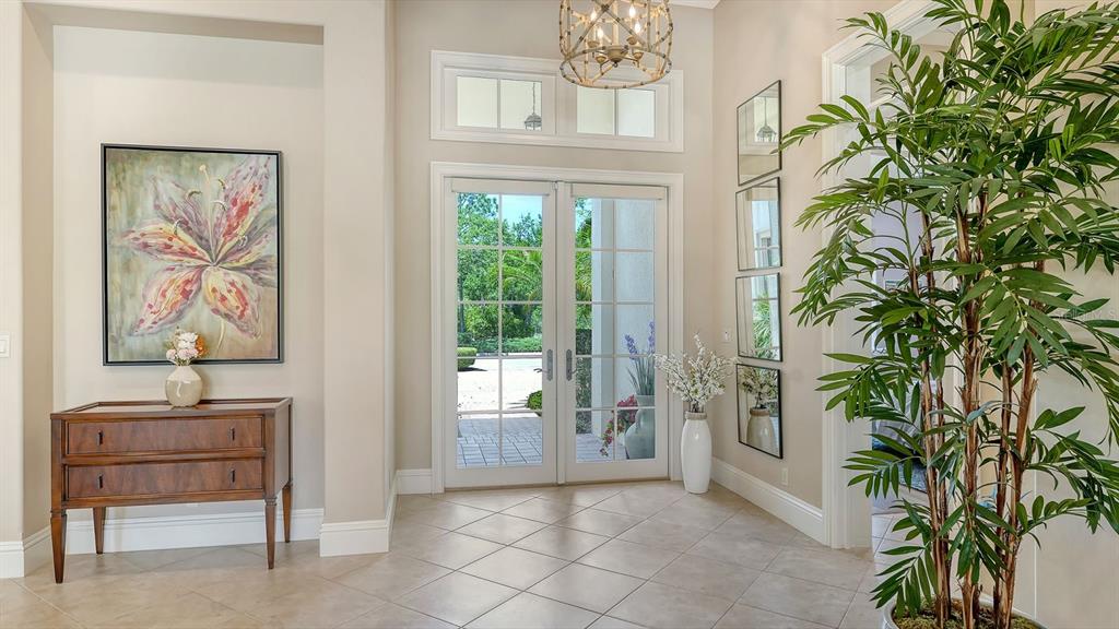 7975 Matera Court Lakewood Ranch, FL 34202 - Photo 14 of 83 a view of room with furniture and a potted plant