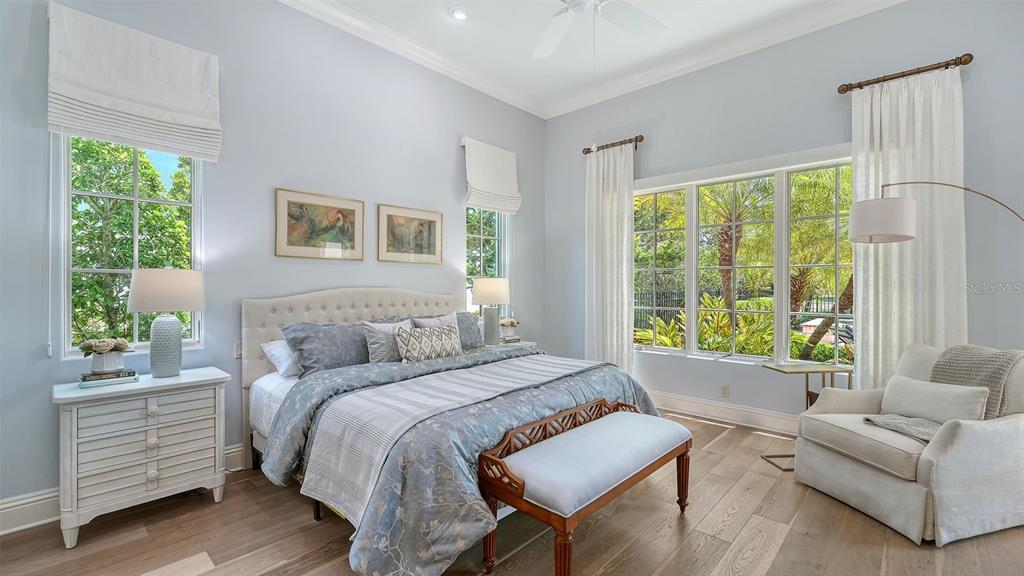 7975 Matera Court Lakewood Ranch, FL 34202 - Photo 27 of 83 a bed room with a bed and a couch