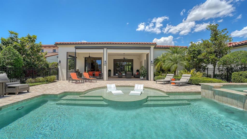 7975 Matera Court Lakewood Ranch, FL 34202 - Photo 53 of 83 a view of a house with swimming pool and sitting area