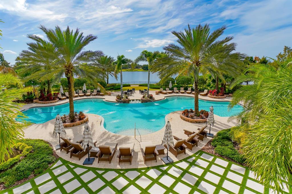 7975 Matera Court Lakewood Ranch, FL 34202 - Photo 76 of 83 a view of a backyard with plants and patio
