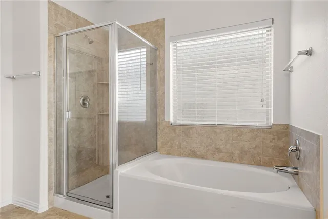 a kitchen with a sink and a refrigerator
