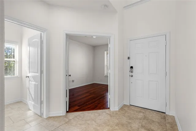 an empty room with mirror