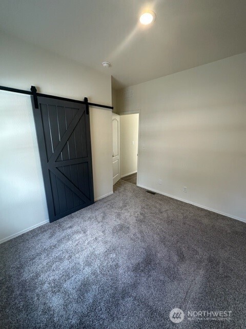 2101 South 324th Street, Unit 228 Federal Way, WA 98003 - Photo 7 of 11 a view of an empty room