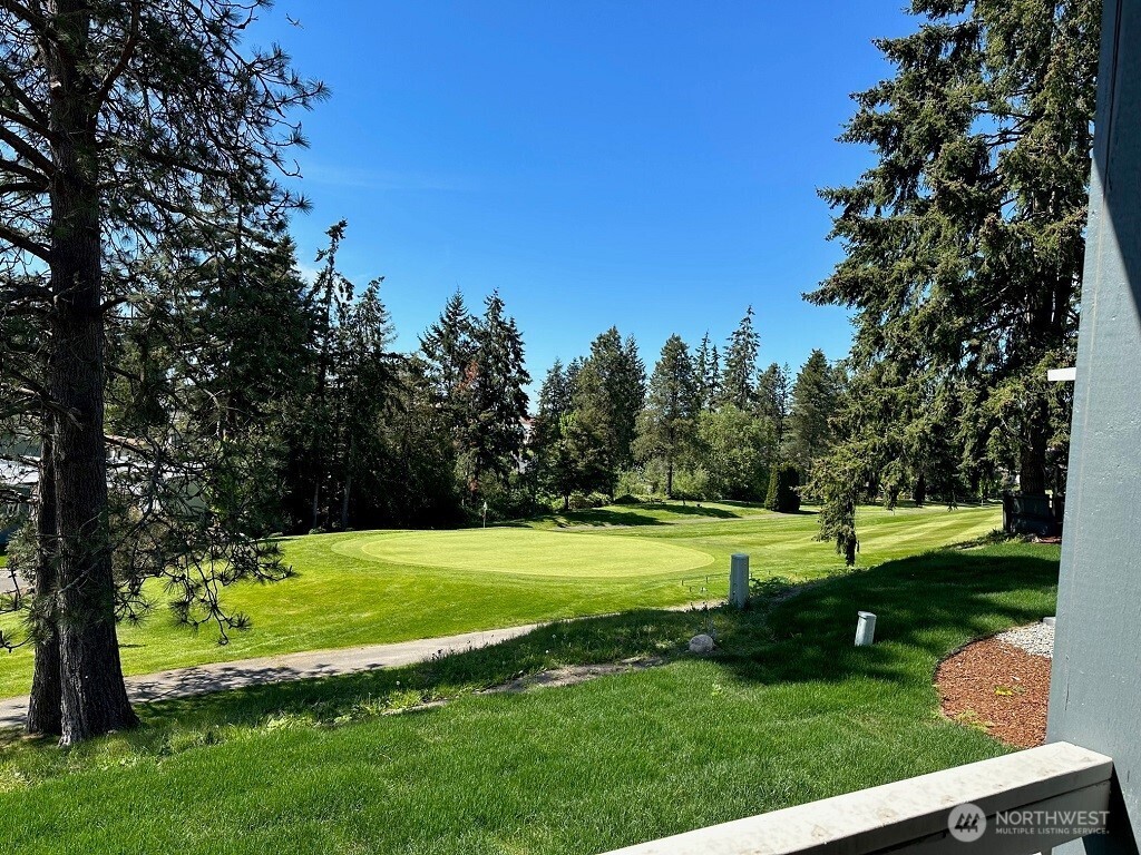 2101 South 324th Street, Unit 228 Federal Way, WA 98003 - Photo 9 of 11 a view of a park with large trees