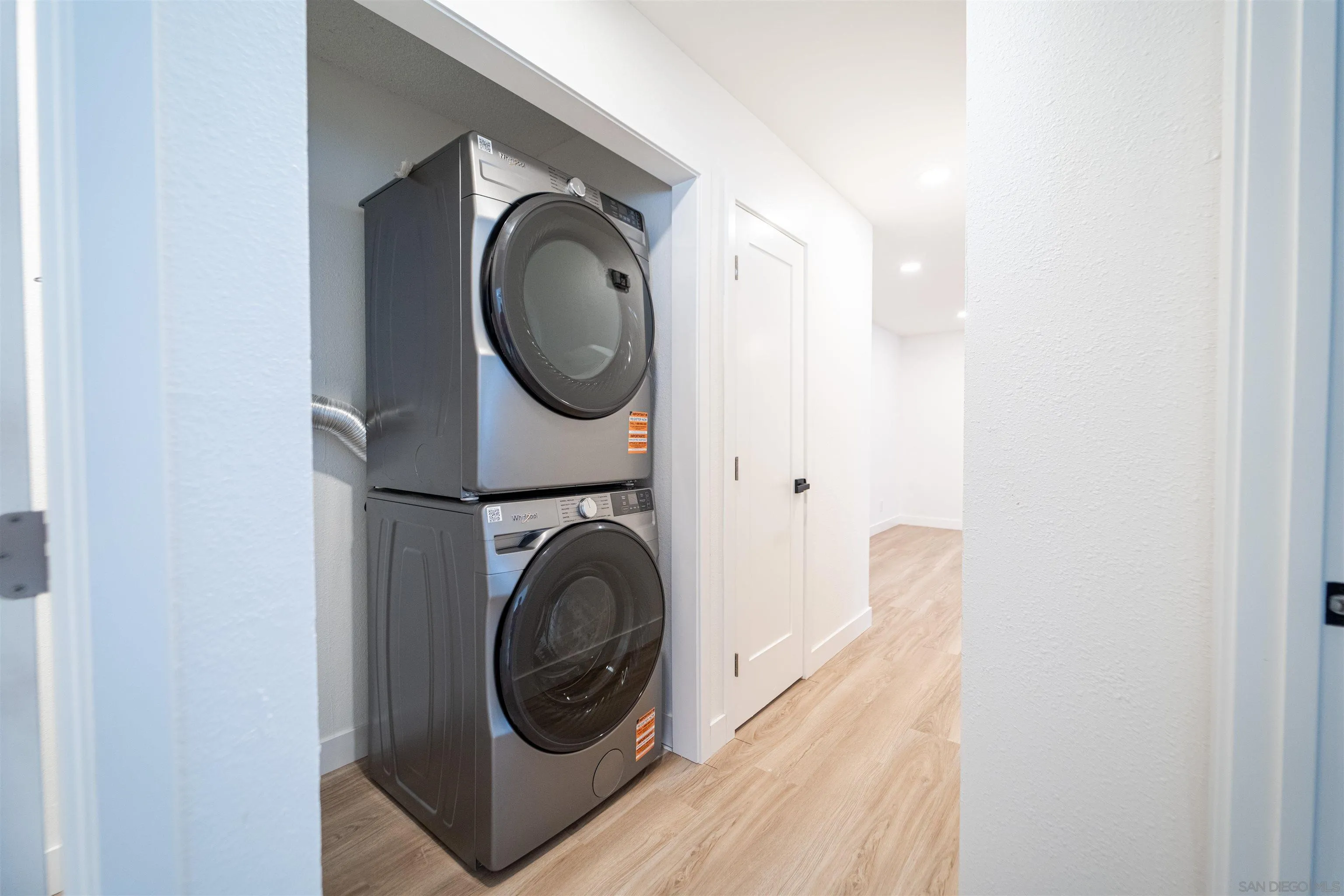 1306 West San Ysidro Boulevard, Unit D San Diego, CA 92173 - Photo 17 of 22 a utility room with dryer and washer