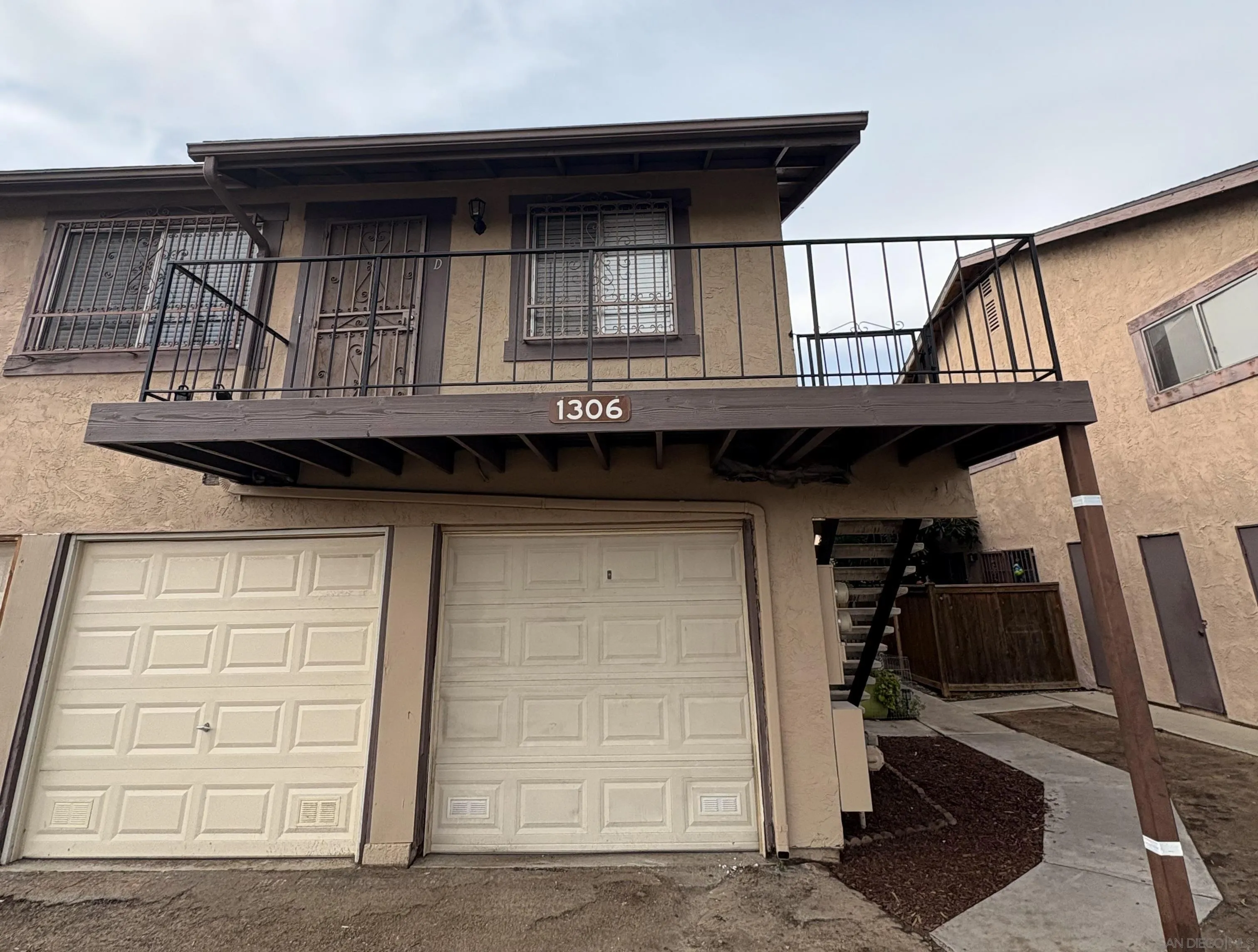 1306 West San Ysidro Boulevard, Unit D San Diego, CA 92173 - Photo 19 of 22 a view of backyard of house