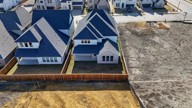 a living room with fireplace furniture and a window
