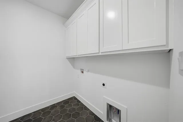 a view of room with cabinets