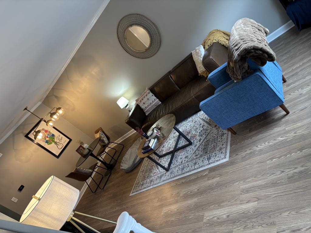 5726 Quince Road, Unit 2 Memphis, TN 38119 - Photo 1 of 7 Living room with wood finished floors