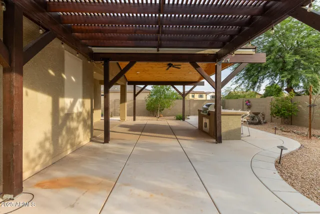 a view of a swimming pool with a patio