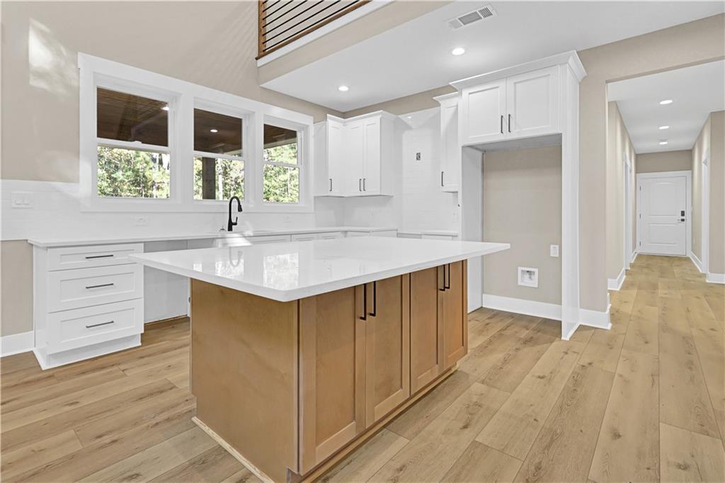 507 North Ridge Road Barnesville, GA 30204 - Photo 17 of 21 a spacious bathroom with a granite countertop sink mirror and double