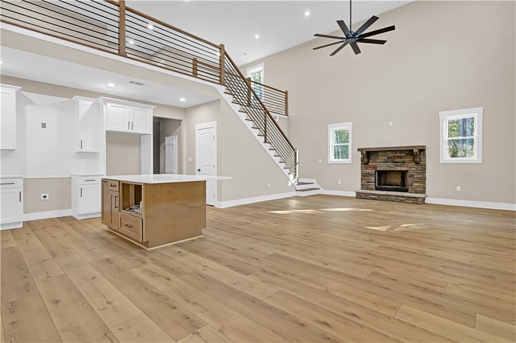 507 North Ridge Road Barnesville, GA 30204 - Photo 20 of 21 a view of an empty room with wooden floor fireplace and a window