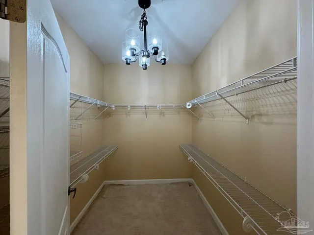 a bathroom with a sink a mirror and a toilet