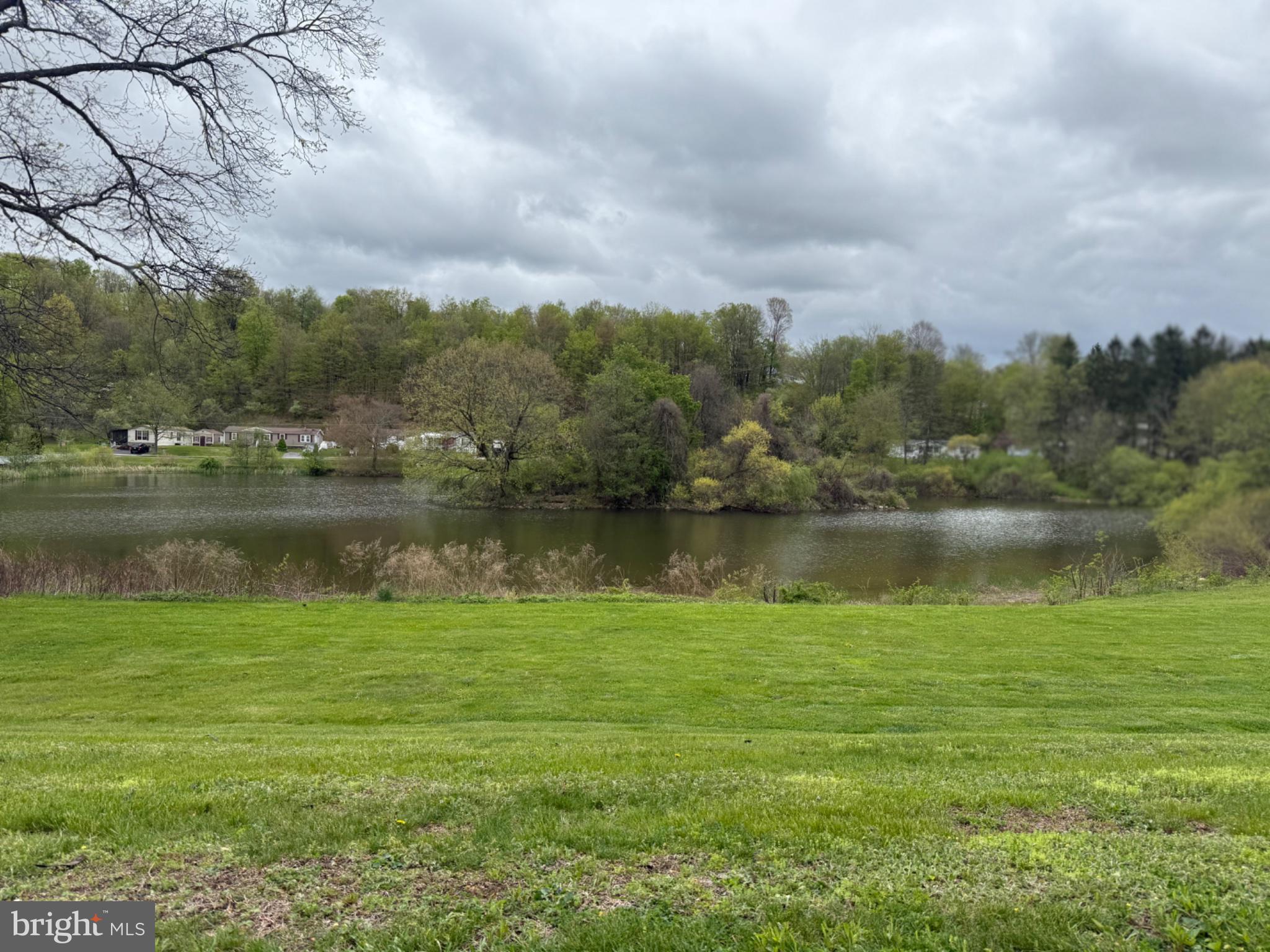 5 Revolutionary Road Mount Bethel, PA 18343 - Photo 27 of 28 Serene lakeside retreat in springtime.