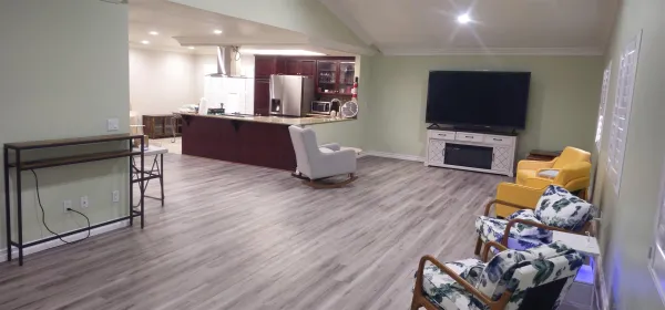 a kitchen with kitchen island granite countertop wooden cabinets and counter space
