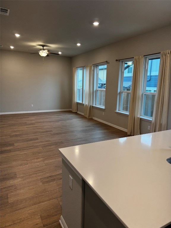 1020 Vista View Drive, Unit 2502 Georgetown, TX 78626 - Photo 14 of 15 Kitchen with dark wood finished floors, recessed lighting, light countertops, open floor plan, and ceiling fan