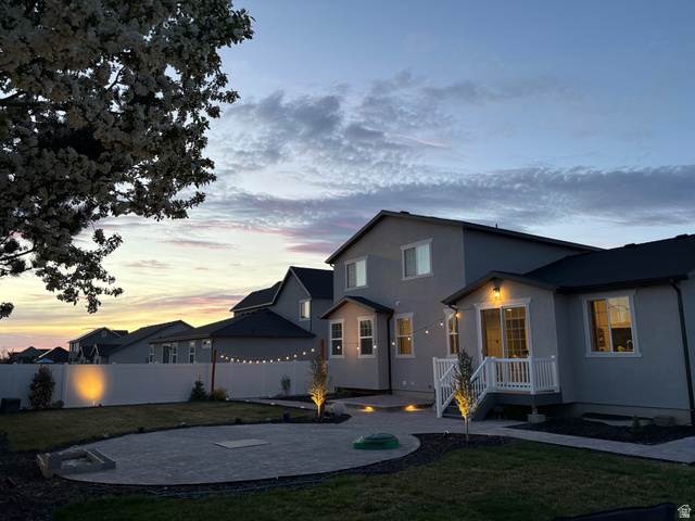 3359 Eurasian Crane Road Clinton, UT 84015 - Photo 68 of 71 View of front of property with a patio area and stucco siding