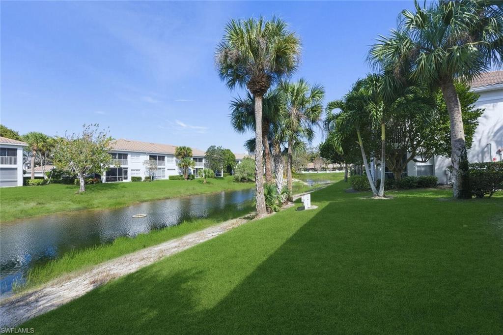 6899 Rain Lily Road, Unit 103 Naples, FL 34109 - Photo 28 of 39 View of property's community featuring a water view