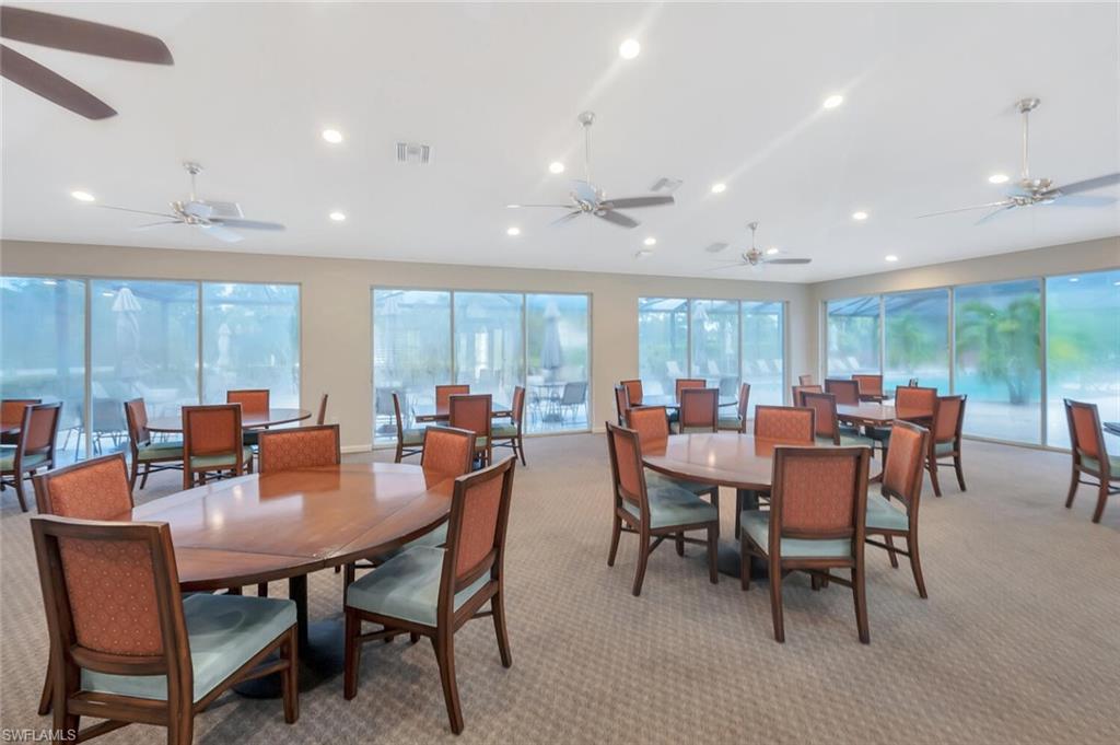 6899 Rain Lily Road, Unit 103 Naples, FL 34109 - Photo 36 of 39 Dining space featuring carpet flooring and recessed lighting