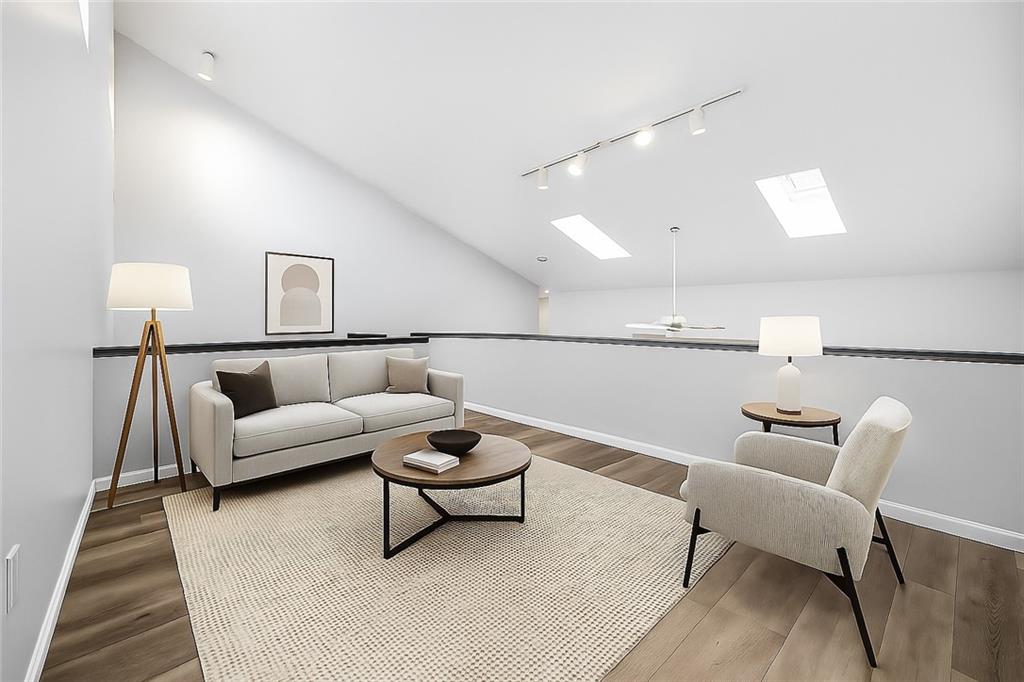 2212 Kenzie Road Pittsburgh, PA 15205 - Photo 25 of 36 a living room with furniture and a rug