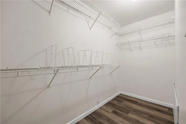 a view of a room with racks on the wall