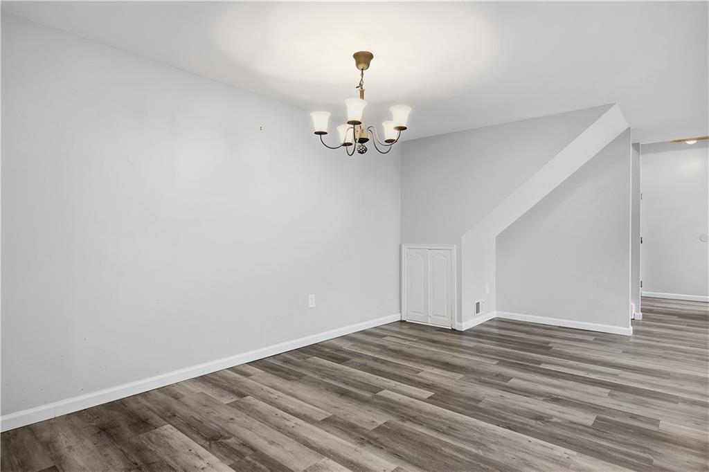 2212 Kenzie Road Pittsburgh, PA 15205 - Photo 10 of 36 a view of a room with wooden floor and ceiling fan