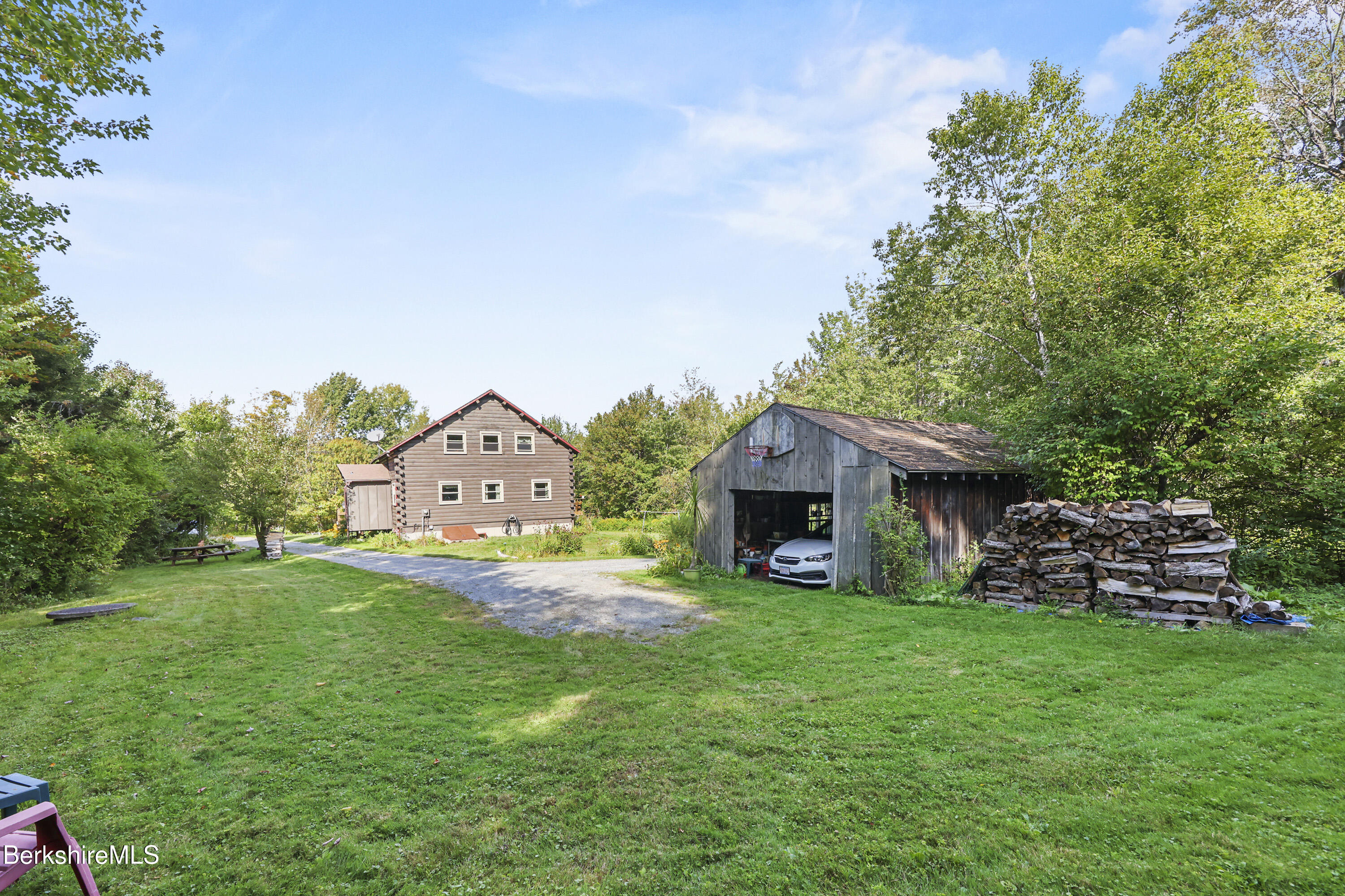 78 East Main Road Peru, MA 01235 - Photo 46 of 56 a front view of a house with garden
