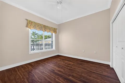 a view of a chair and table in the porch