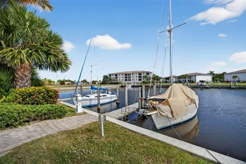 a view of a lake with a car parked