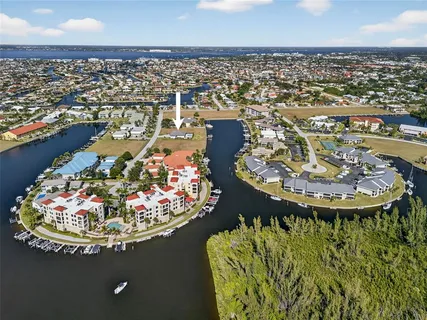 a view of a chair and tables in the patio