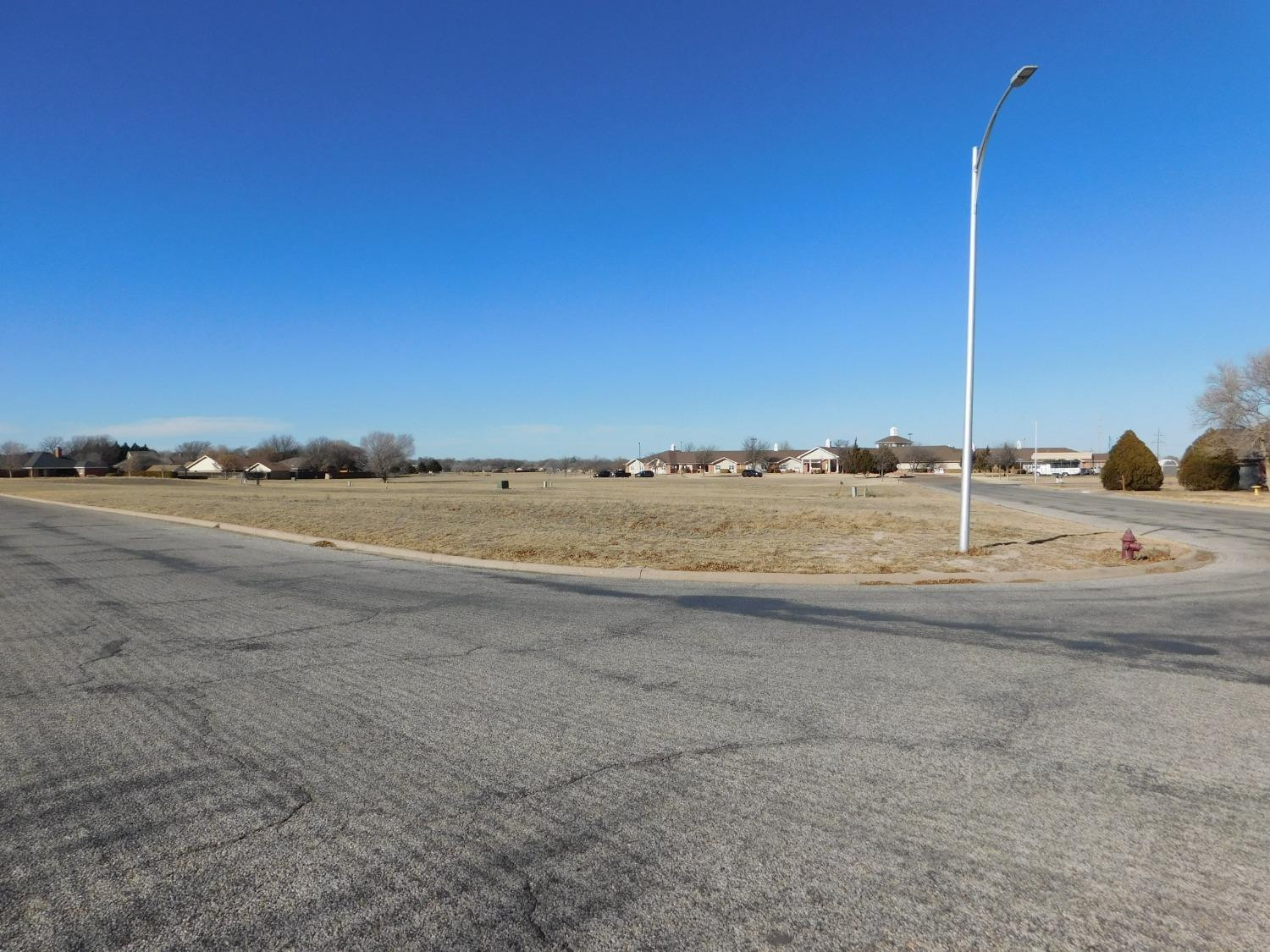 913 West 14th Street Muleshoe, TX 79347 - Photo 3 of 4 a view of a road with an ocean view