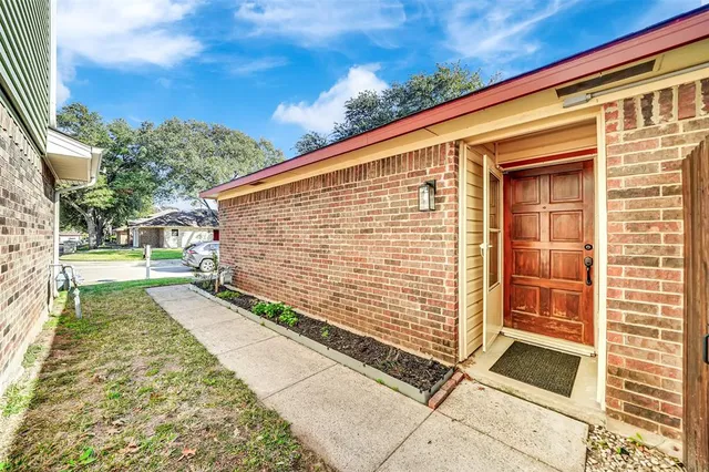 a view of a back yard of the house