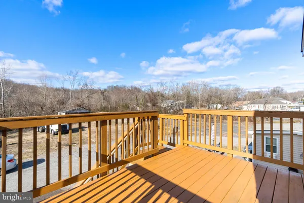 a view of balcony with furniture