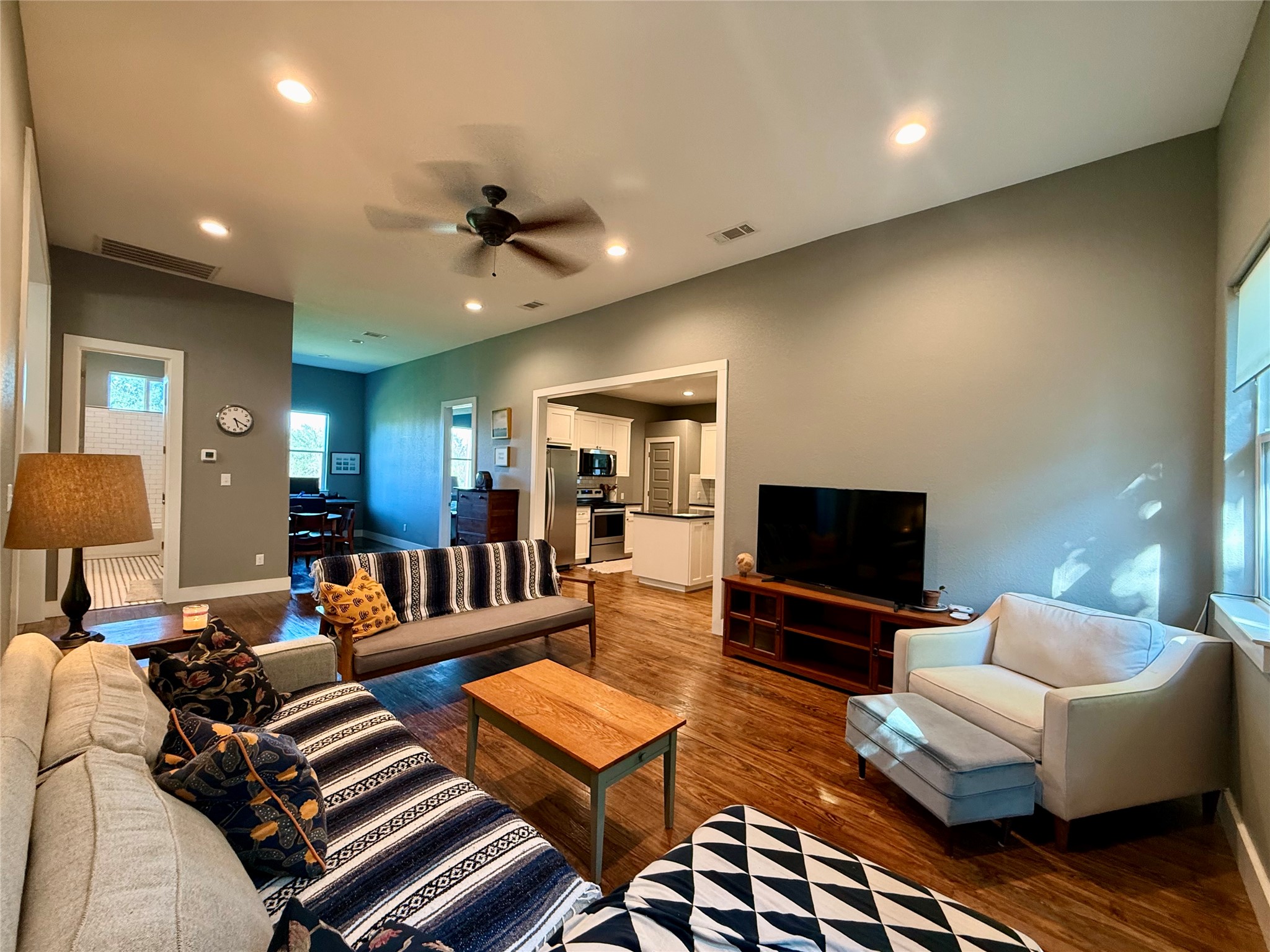 739 Pleasant Grove Road Elgin, TX 78621 - Photo 7 of 29 Spacious living area featuring wood-finish flooring, recessed lighting, and a ceiling fan