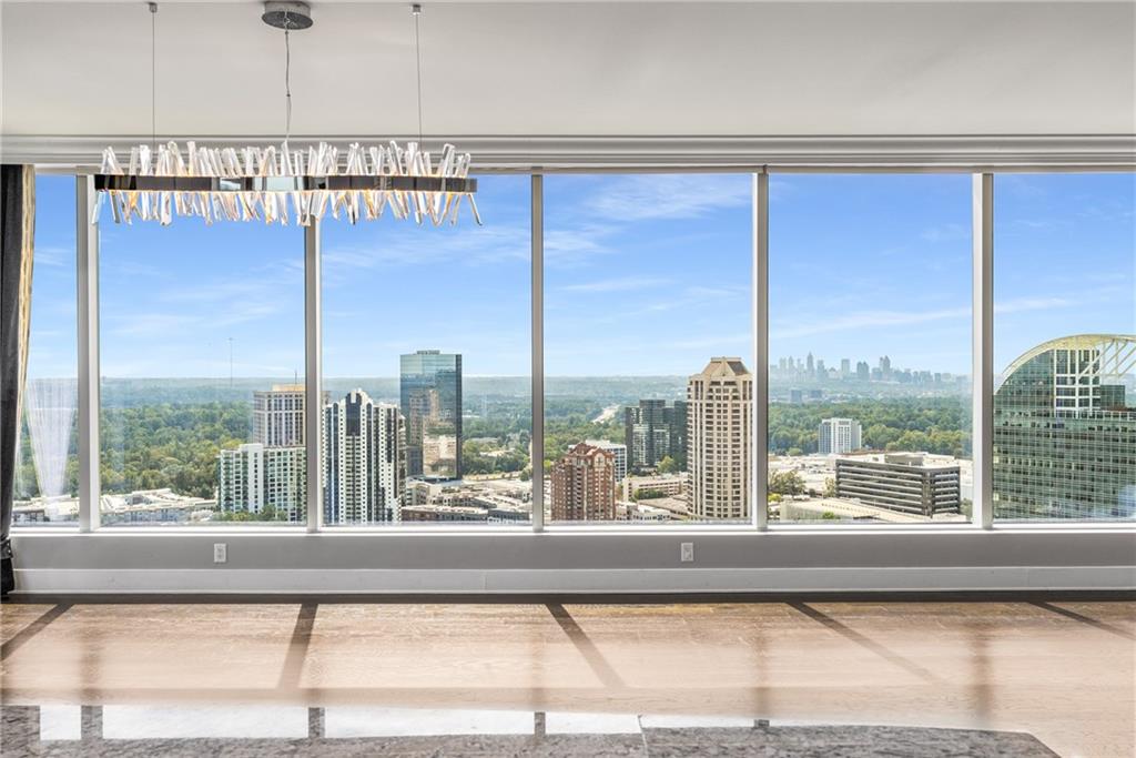 3630 Peachtree Road Northeast, Unit 2404 Atlanta, GA 30326 - Photo 12 of 48 a view of a city from a balcony