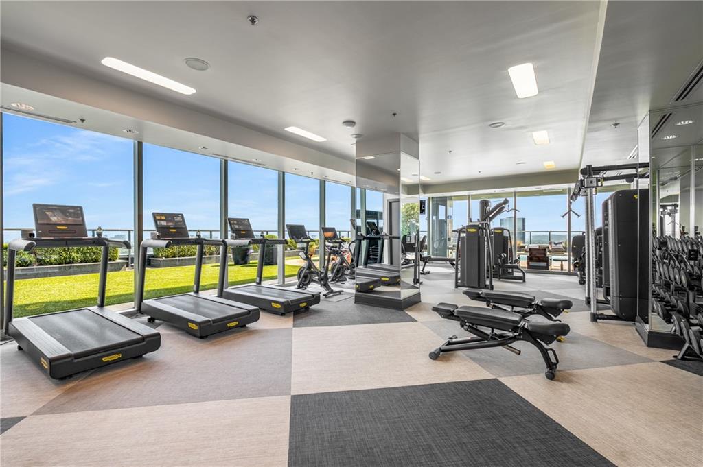3630 Peachtree Road Northeast, Unit 2404 Atlanta, GA 30326 - Photo 31 of 48 a view of a room with gym equipment