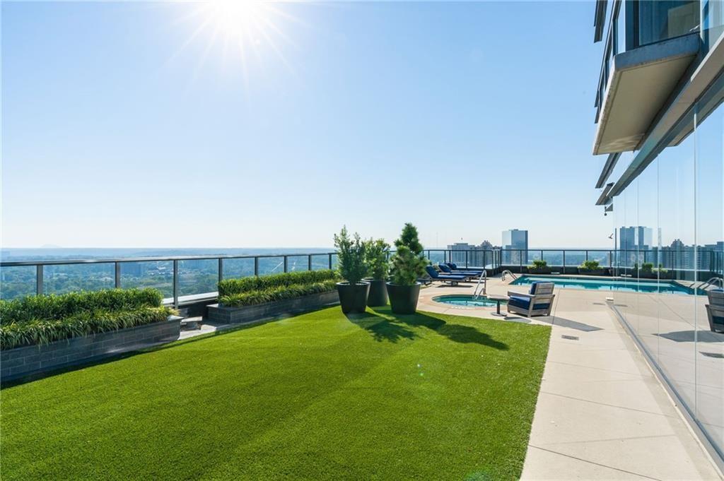 3630 Peachtree Road Northeast, Unit 2404 Atlanta, GA 30326 - Photo 35 of 48 a view of a backyard with sitting area