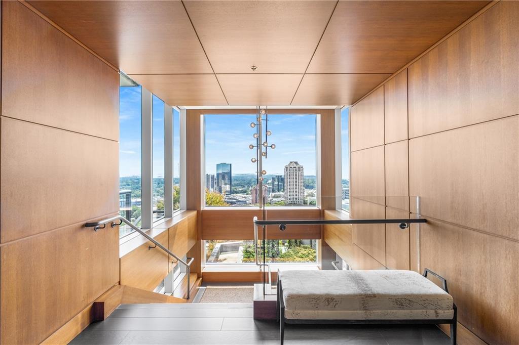 3630 Peachtree Road Northeast, Unit 2404 Atlanta, GA 30326 - Photo 46 of 48 a bedroom with furniture and a window