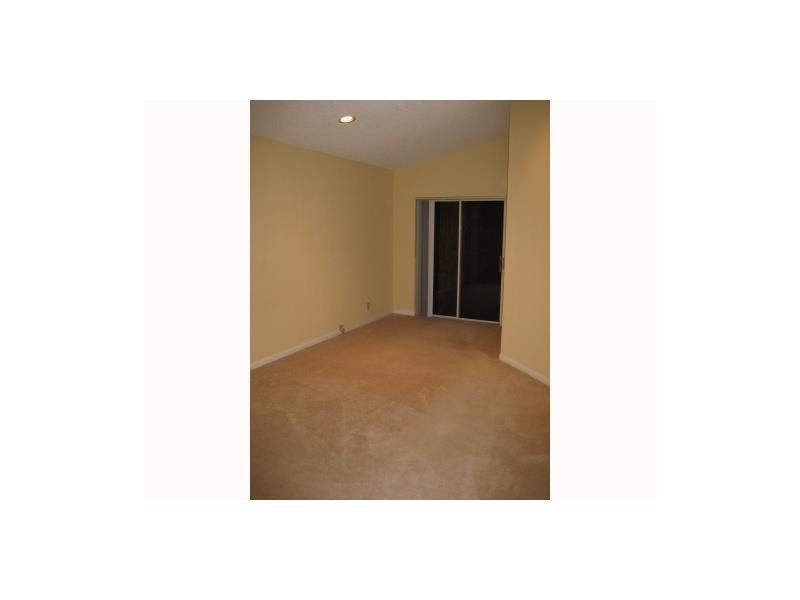 834 Banks Road, Unit 834 Pompano Beach, FL 33063 - Photo 3 of 8 Master Bedroom