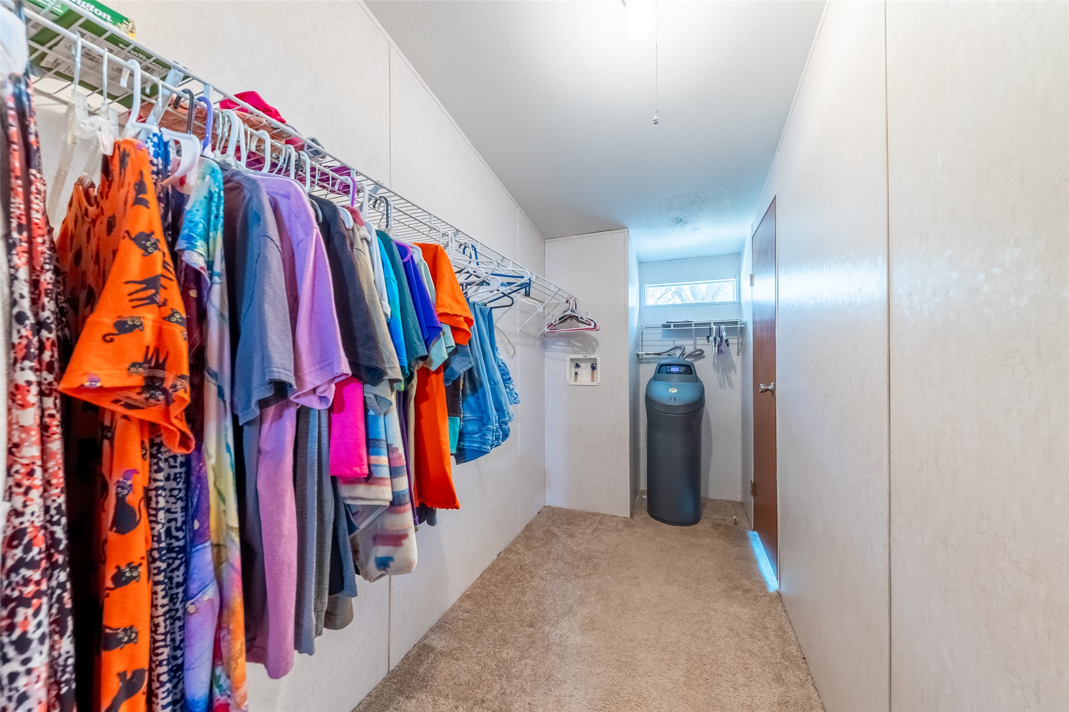 212 Fox Road San Marcos, TX 78666 - Photo 13 of 18 a view of walk in closet with clothes