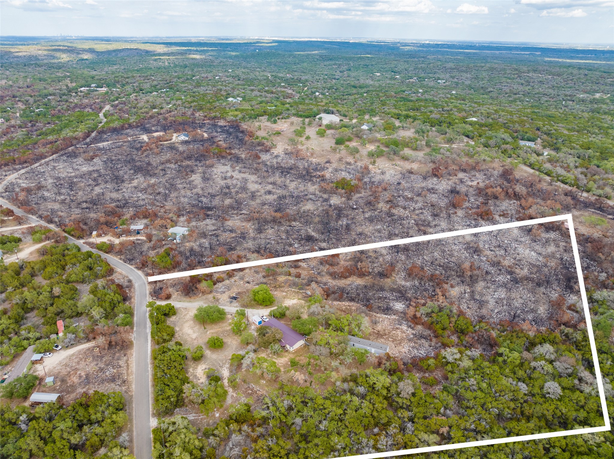 212 Fox Road San Marcos, TX 78666 - Photo 3 of 18 a view of an outdoor space with wooden floor