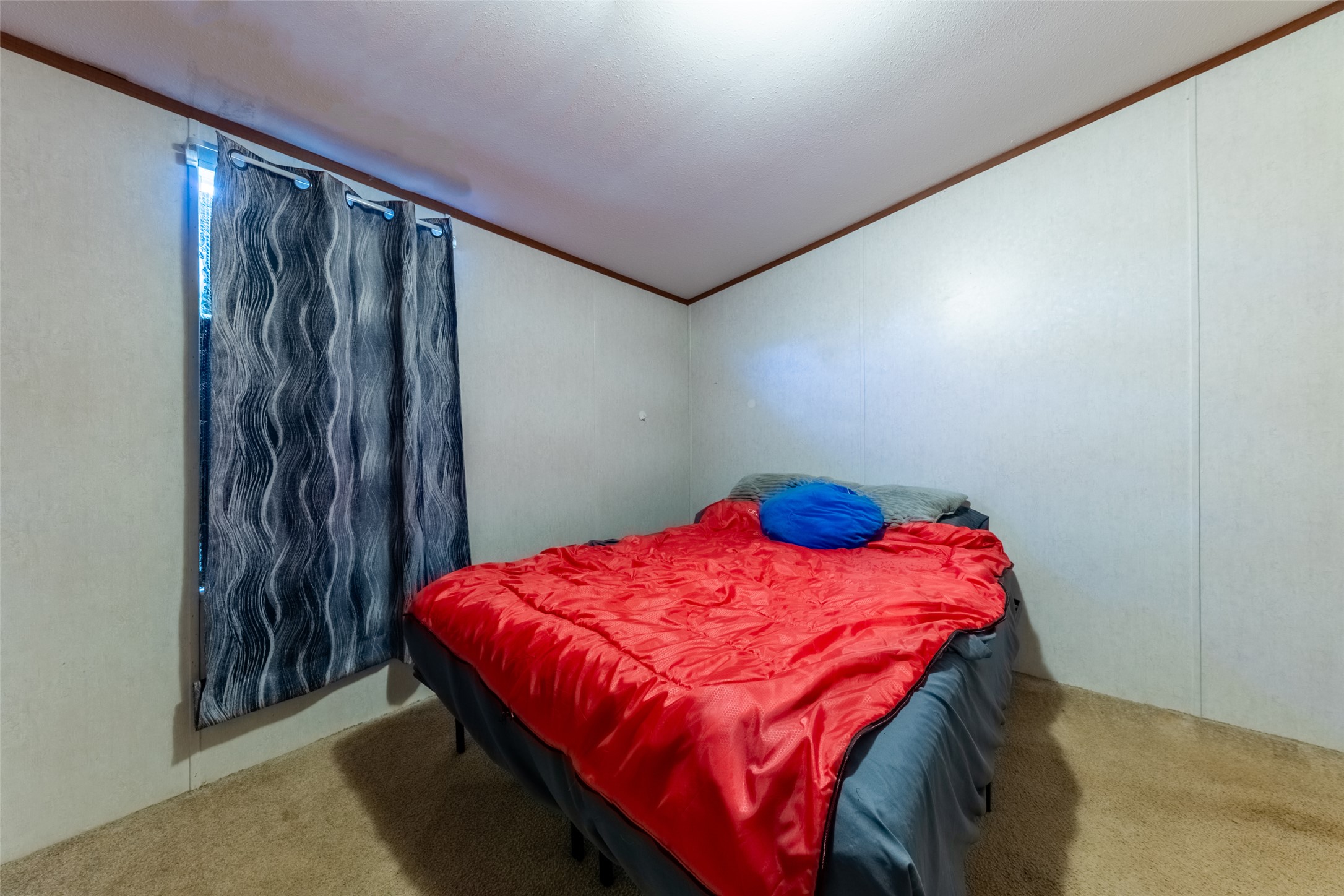 212 Fox Road San Marcos, TX 78666 - Photo 4 of 18 a bedroom with a bed and a closet