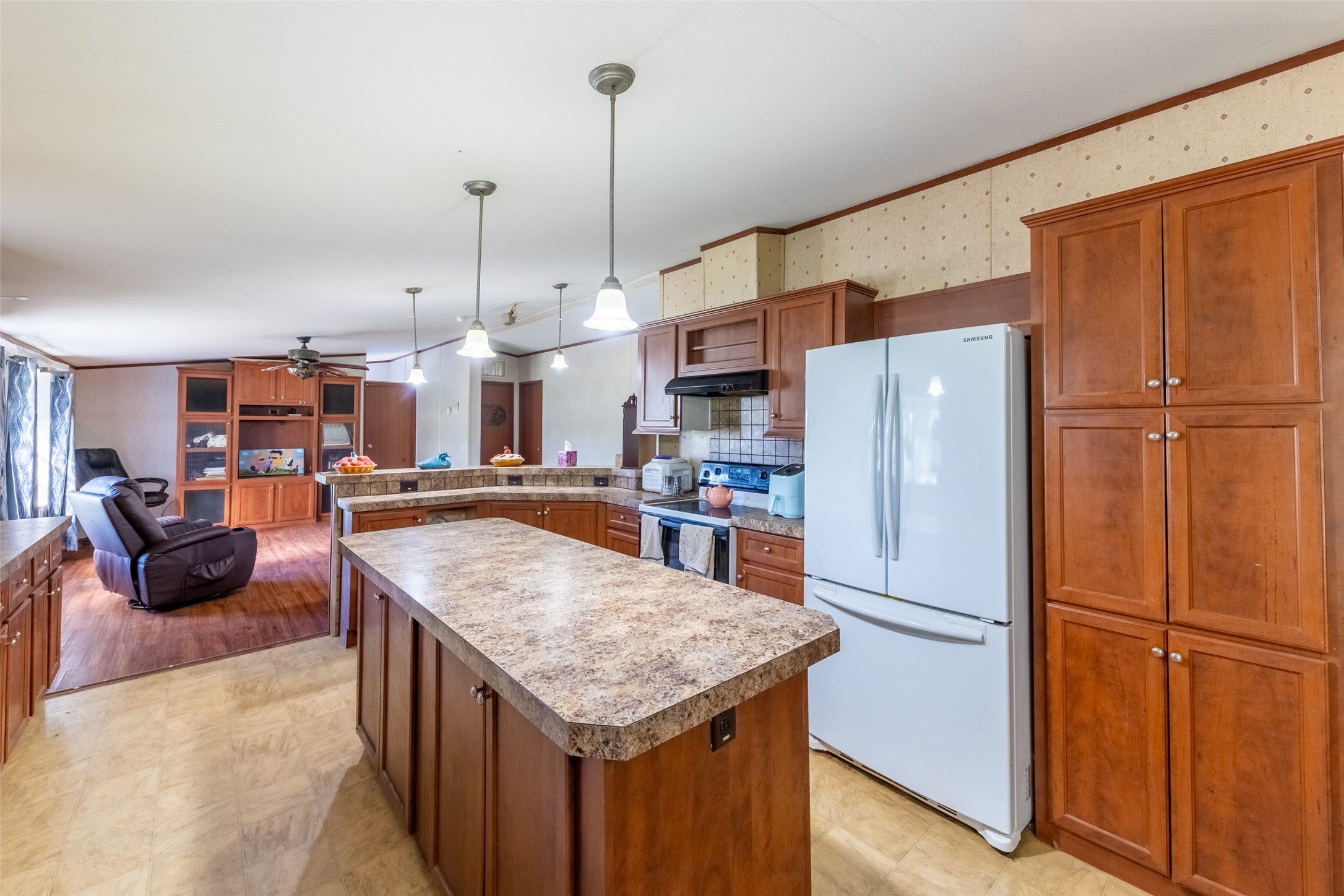 212 Fox Road San Marcos, TX 78666 - Photo 18 of 18 a kitchen with stainless steel appliances granite countertop a refrigerator a oven and a sink
