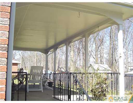 685 Magnolia Road North Brunswick, NJ 08902 - Photo 14 of 15 a view of a chairs and table in patio
