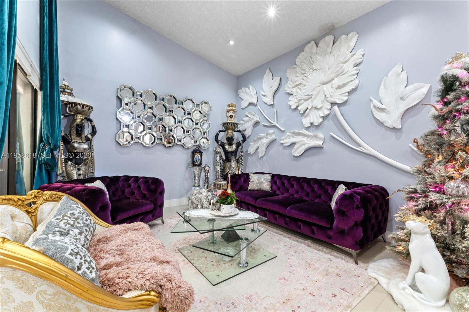 5018 Southwest 148th Place Miami, FL 33185 - Photo 3 of 14 a living room with furniture or couch and a potted plant