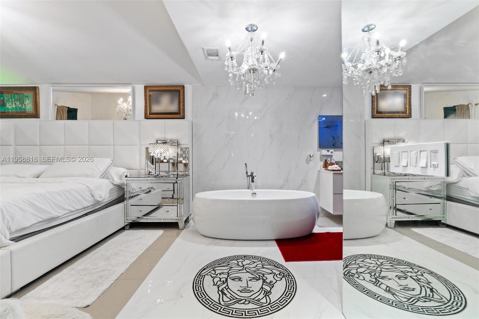 5018 Southwest 148th Place Miami, FL 33185 - Photo 6 of 14 a living room with furniture and a chandelier