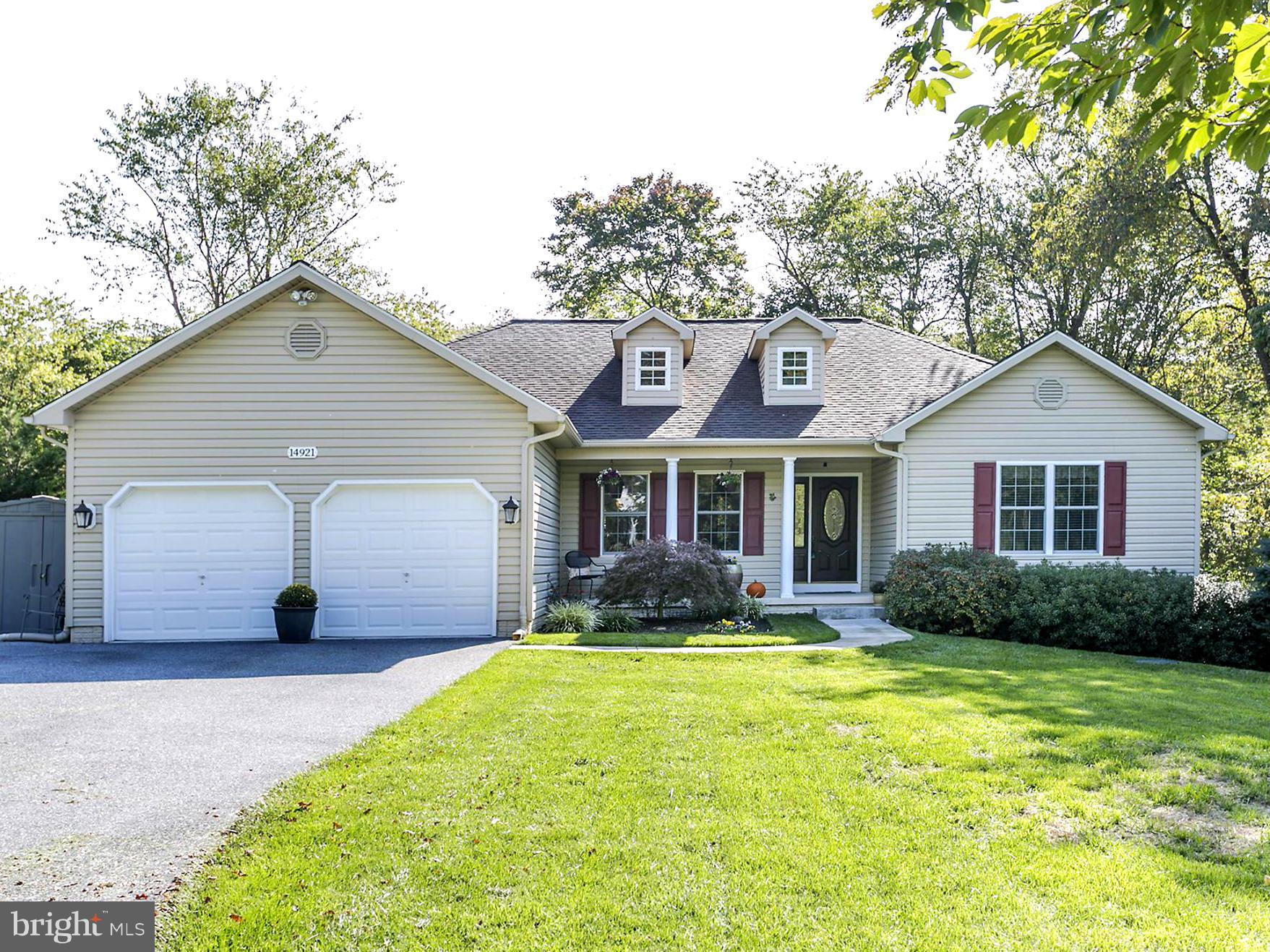14921 Harrisville Road Mount Airy, MD 21771 - Photo 1 of 28 a front view of a house with garden