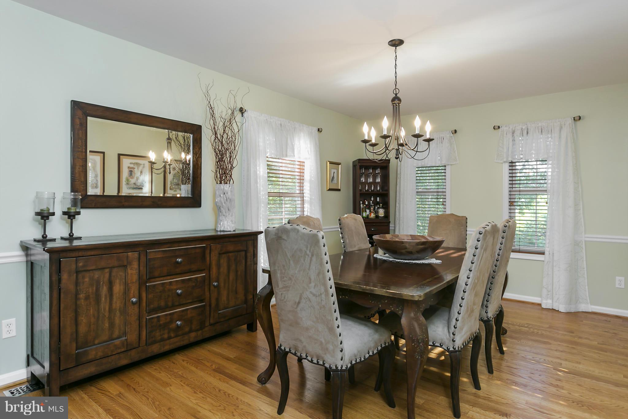 14921 Harrisville Road Mount Airy, MD 21771 - Photo 13 of 28 a view of a dining room with furniture window and wooden floor