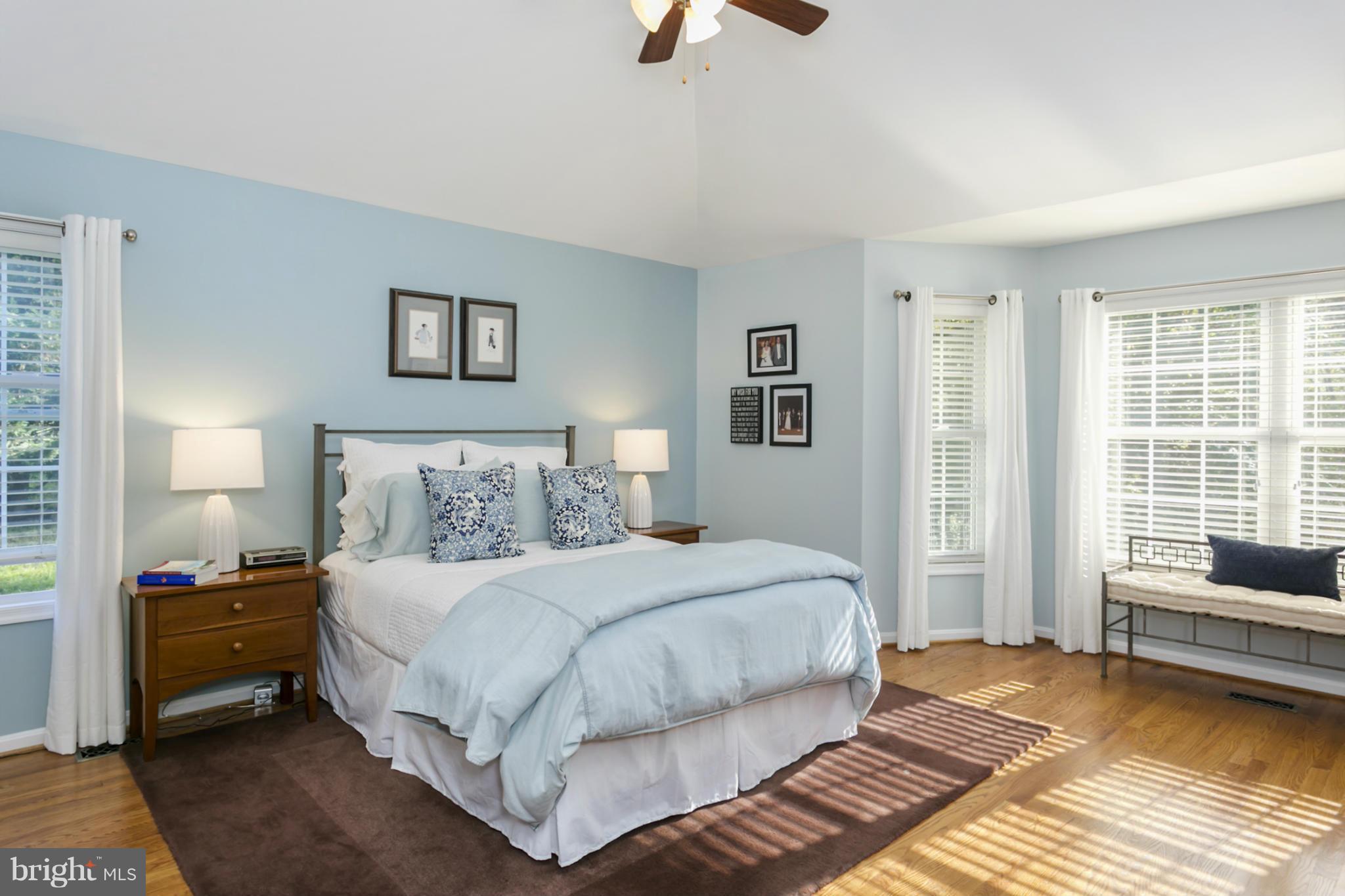 14921 Harrisville Road Mount Airy, MD 21771 - Photo 14 of 28 a bedroom with a bed and wooden floor