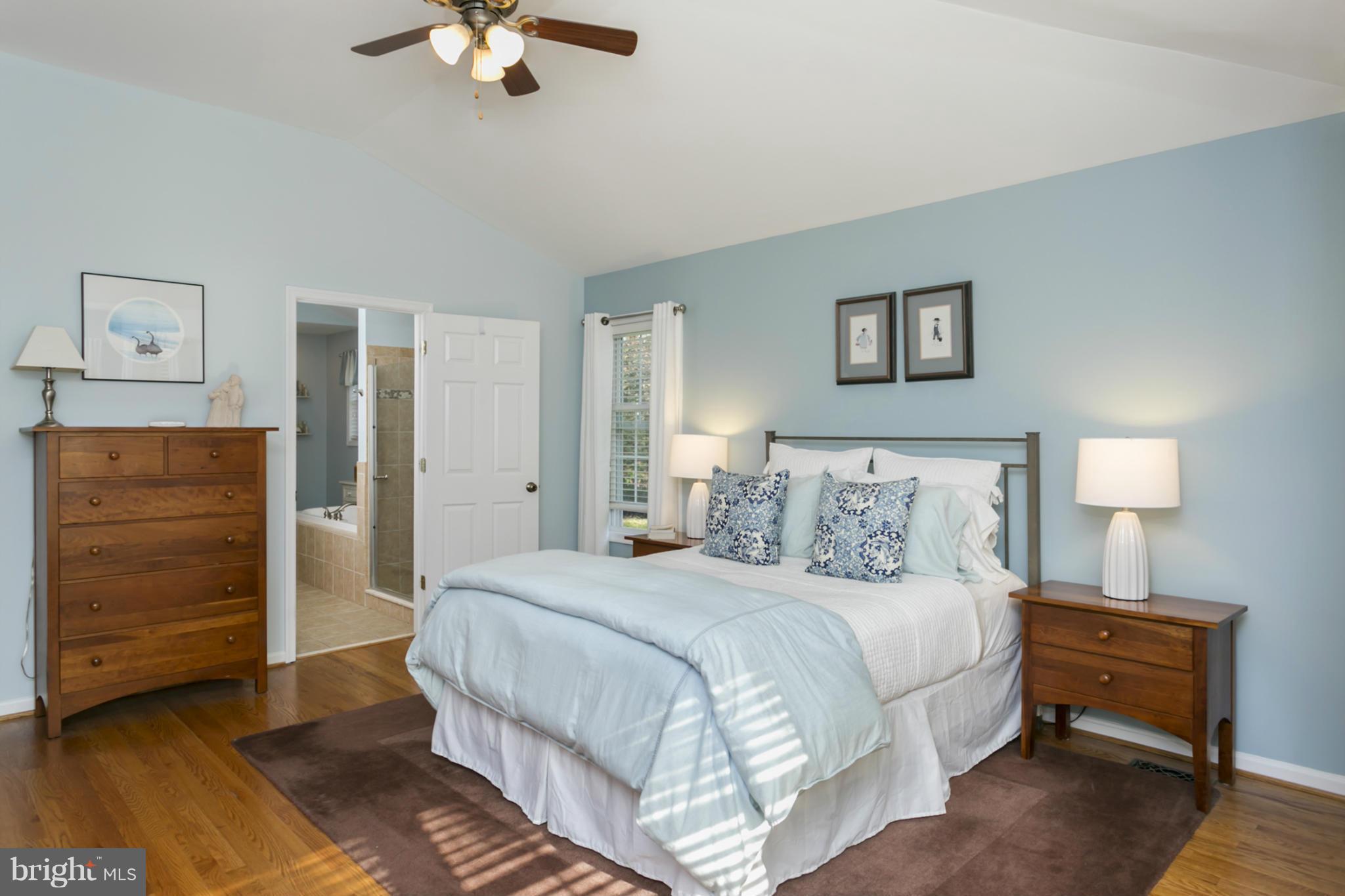 14921 Harrisville Road Mount Airy, MD 21771 - Photo 15 of 28 a bedroom with a bed and a ceiling fan
